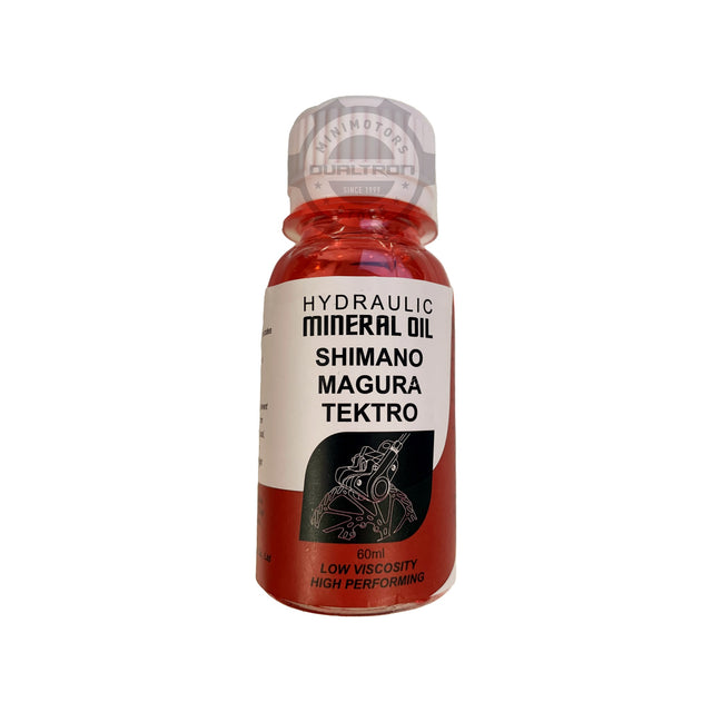 Bidon 1 litre d'huile minérale de frein rouge Shimano pour freinage hydraulique